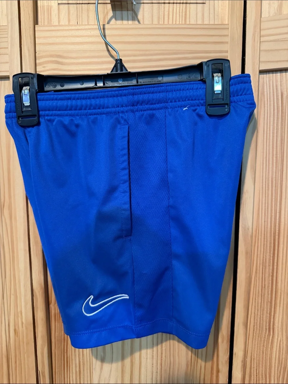 Nike Blue Kids Athletic Shorts with White Swoosh
